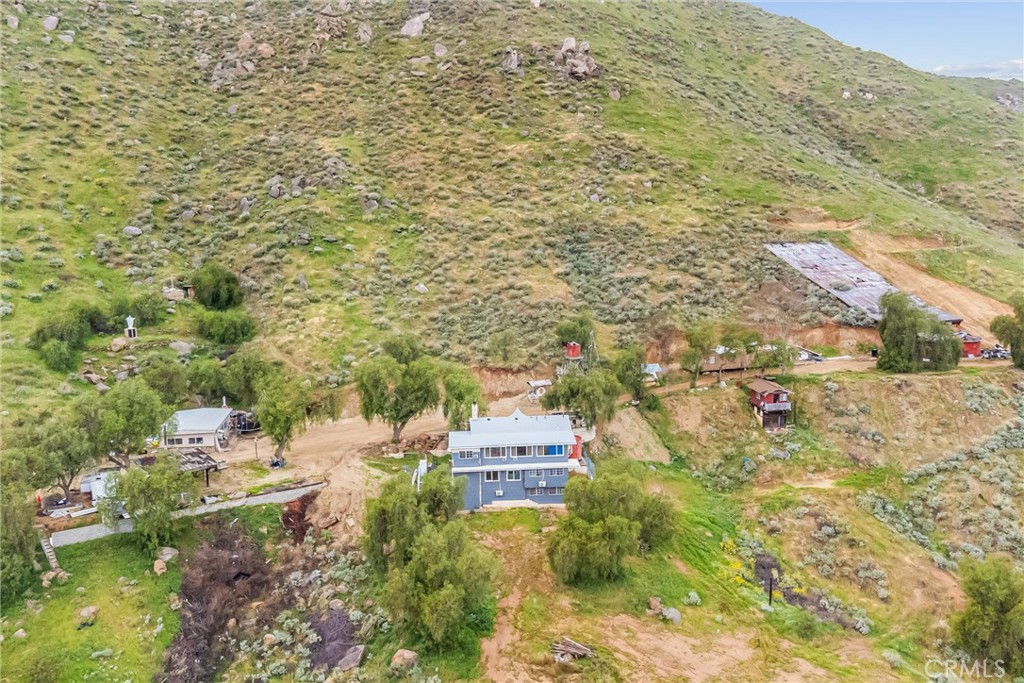 a aerial view of residential houses with outdoor space