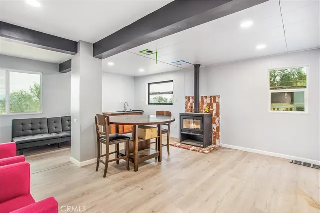a kitchen with a sink and a stove top oven