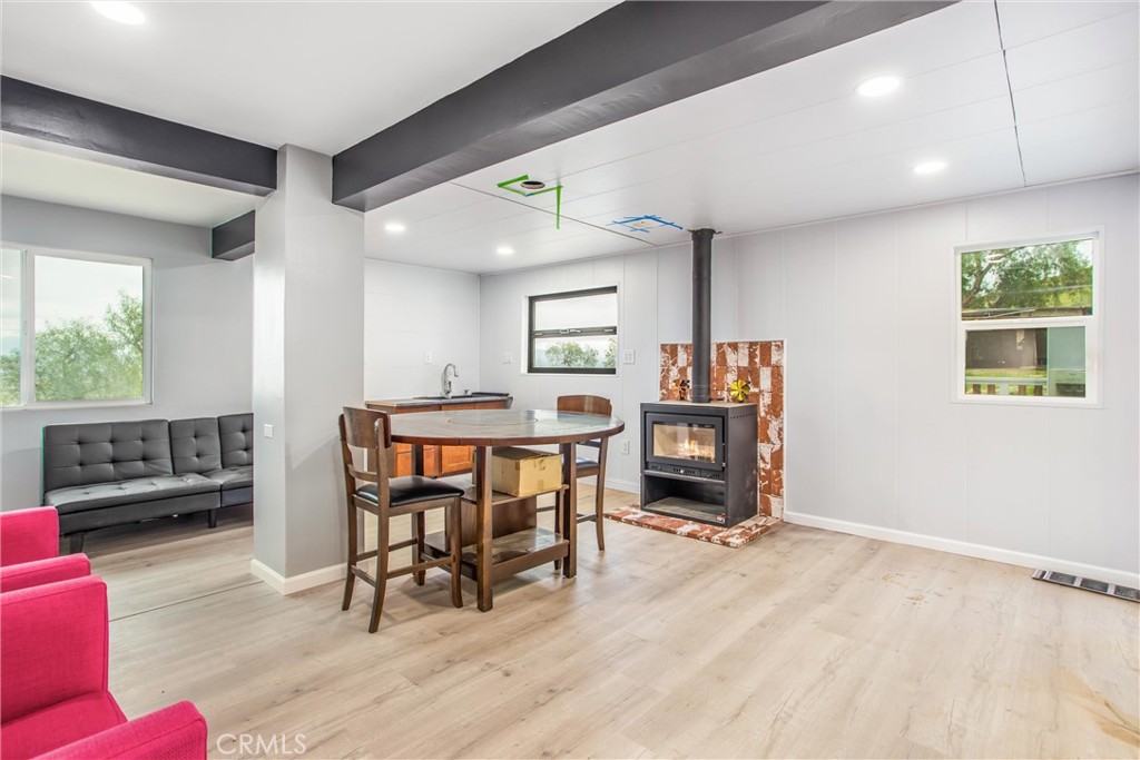 23255 Warren Road San Jacinto, CA 92582 - Photo 14 of 56 a view of a livingroom with furniture and a window