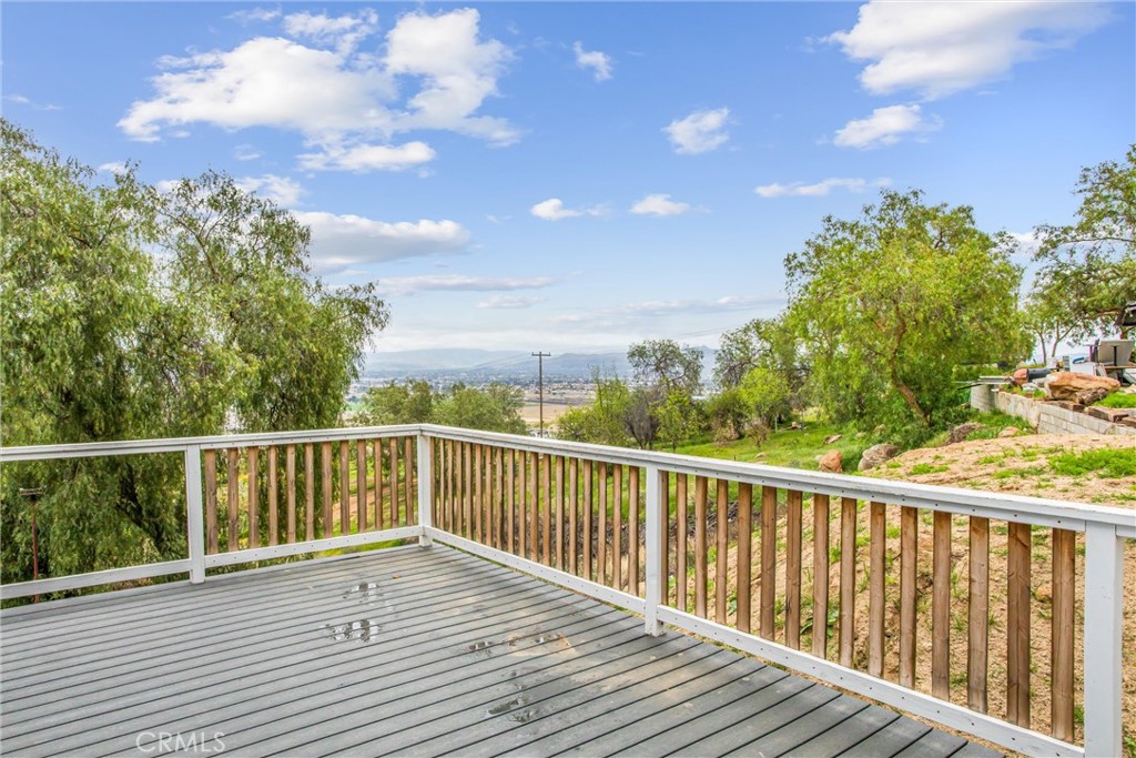 23255 Warren Road San Jacinto, CA 92582 - Photo 27 of 56 a view of a balcony with wooden floor