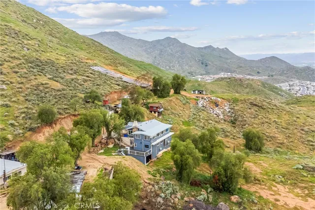 a view of a city with mountains in the background
