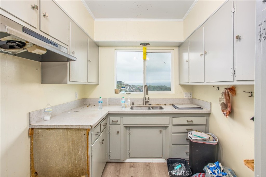 23255 Warren Road San Jacinto, CA 92582 - Photo 32 of 56 a utility room with sink dryer and washer