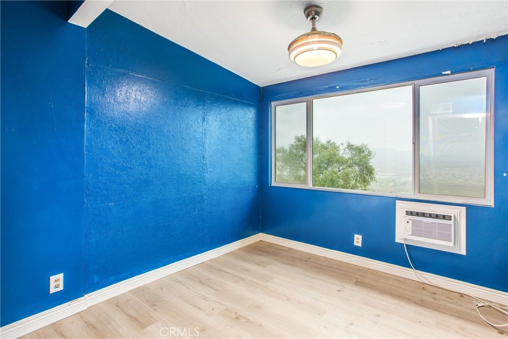 23255 Warren Road San Jacinto, CA 92582 - Photo 34 of 56 a view of an empty room with a window