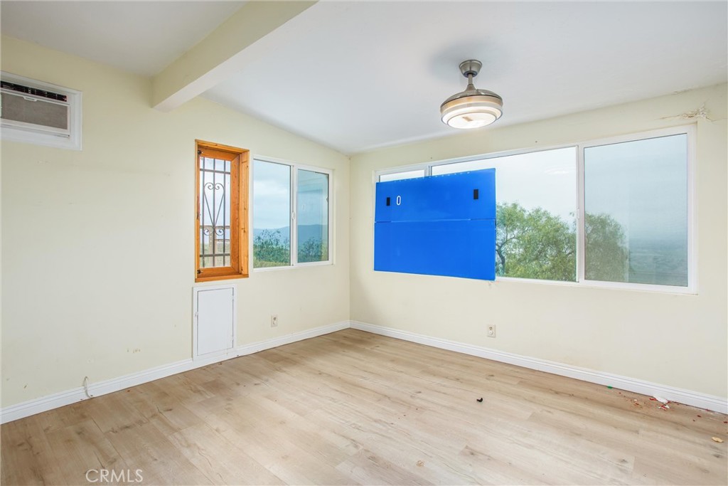 23255 Warren Road San Jacinto, CA 92582 - Photo 37 of 56 an empty room with windows