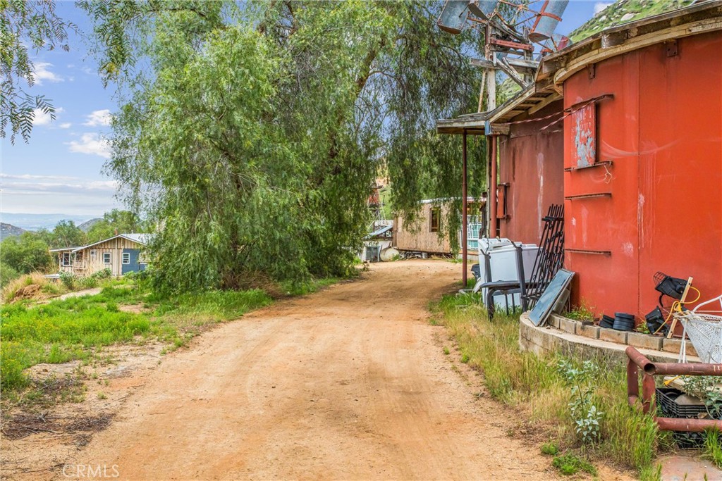 23255 Warren Road San Jacinto, CA 92582 - Photo 49 of 56 front view of a house with a yard