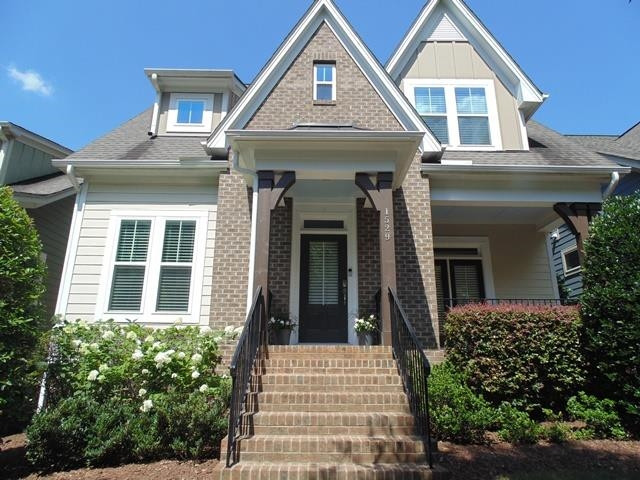 1529 Fullerton Place Raleigh, NC 27607 - Photo 2 of 53 a front view of a house with a yard