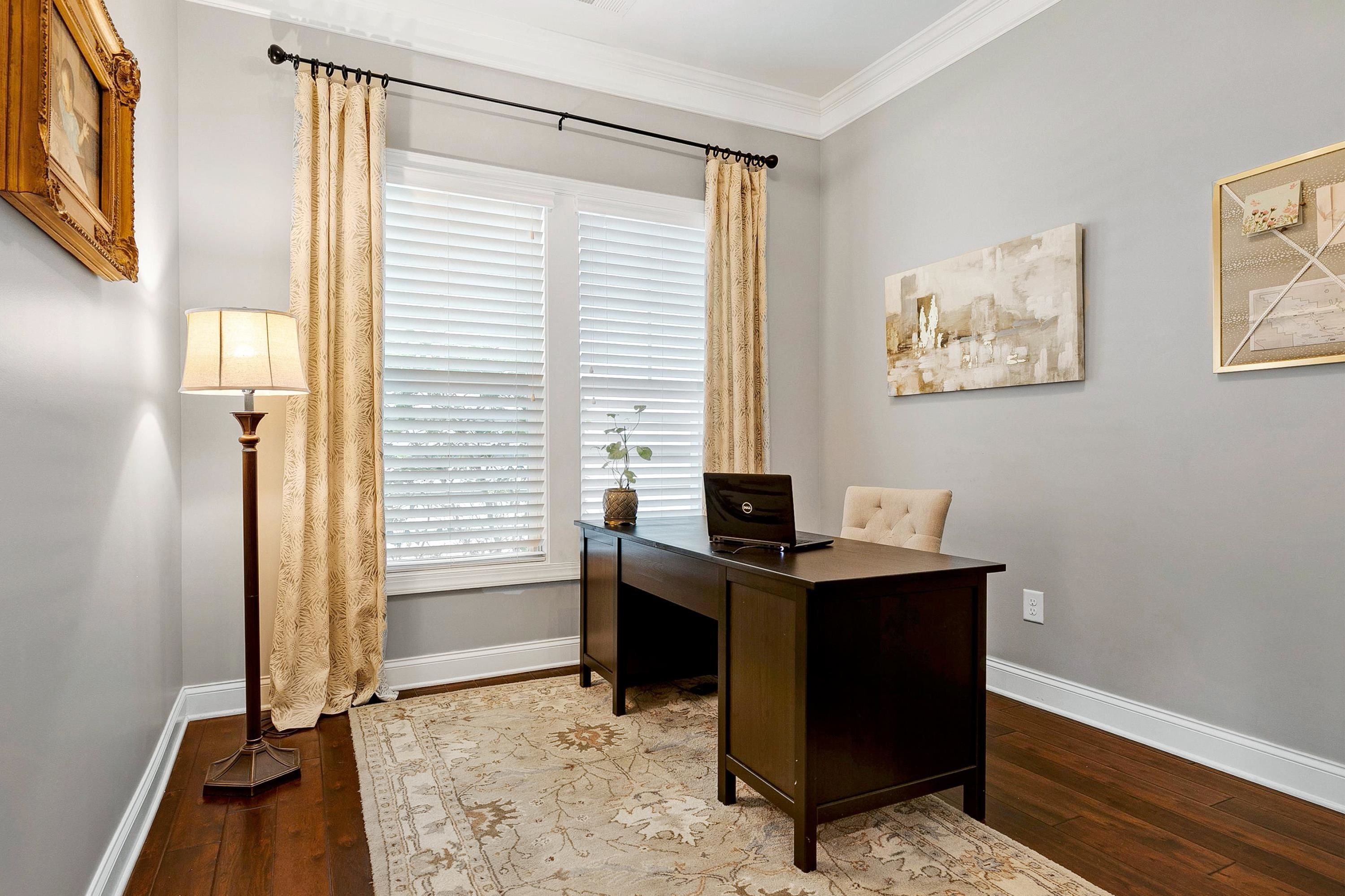 1529 Fullerton Place Raleigh, NC 27607 - Photo 23 of 53 a view of a workspace with furniture and a window