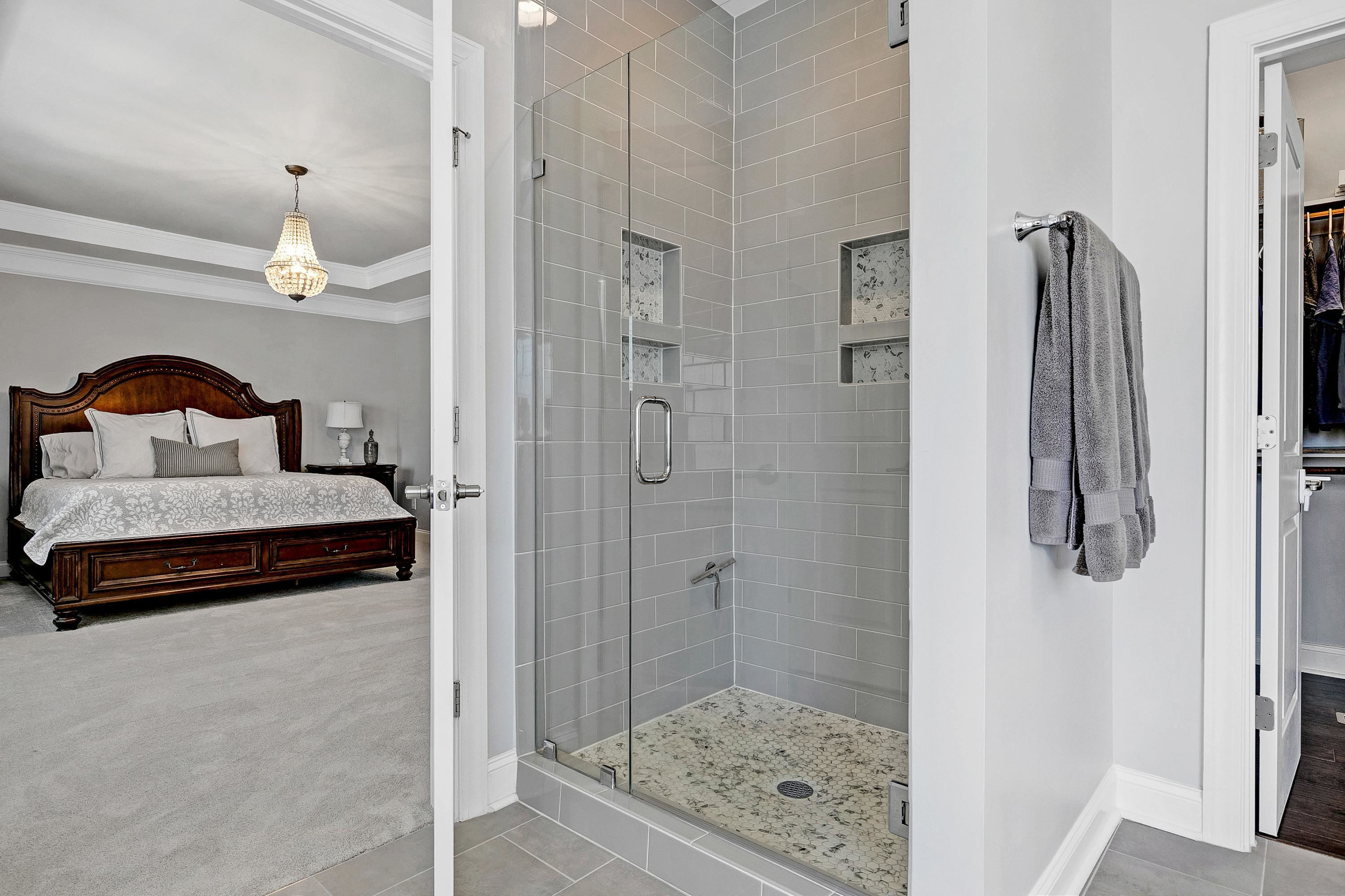 1529 Fullerton Place Raleigh, NC 27607 - Photo 29 of 53 a bedroom with a bed and a mirror