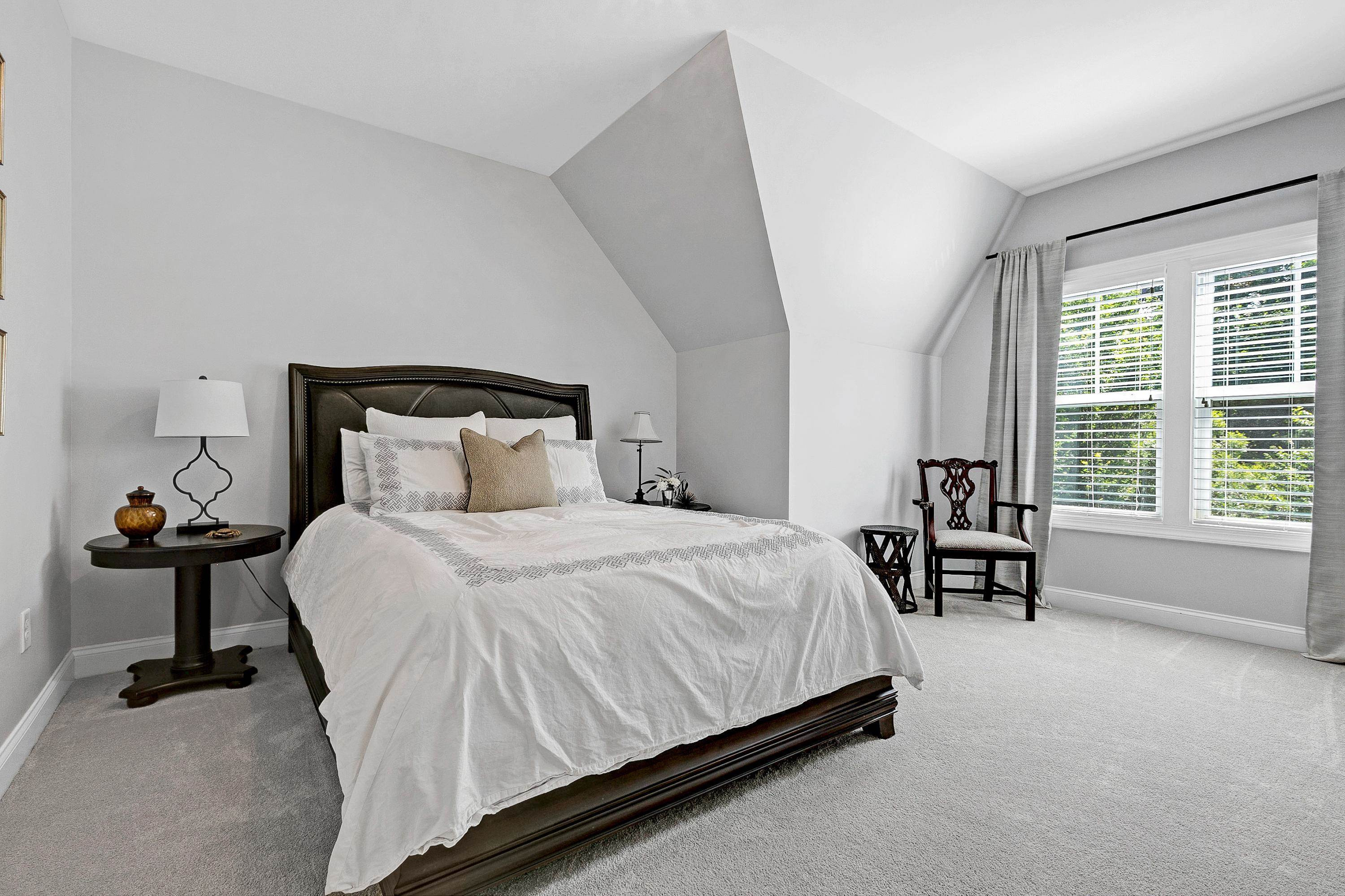 1529 Fullerton Place Raleigh, NC 27607 - Photo 30 of 53 a bedroom with a bed and a window
