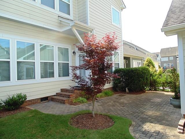 1529 Fullerton Place Raleigh, NC 27607 - Photo 38 of 53 a front view of a house with garden