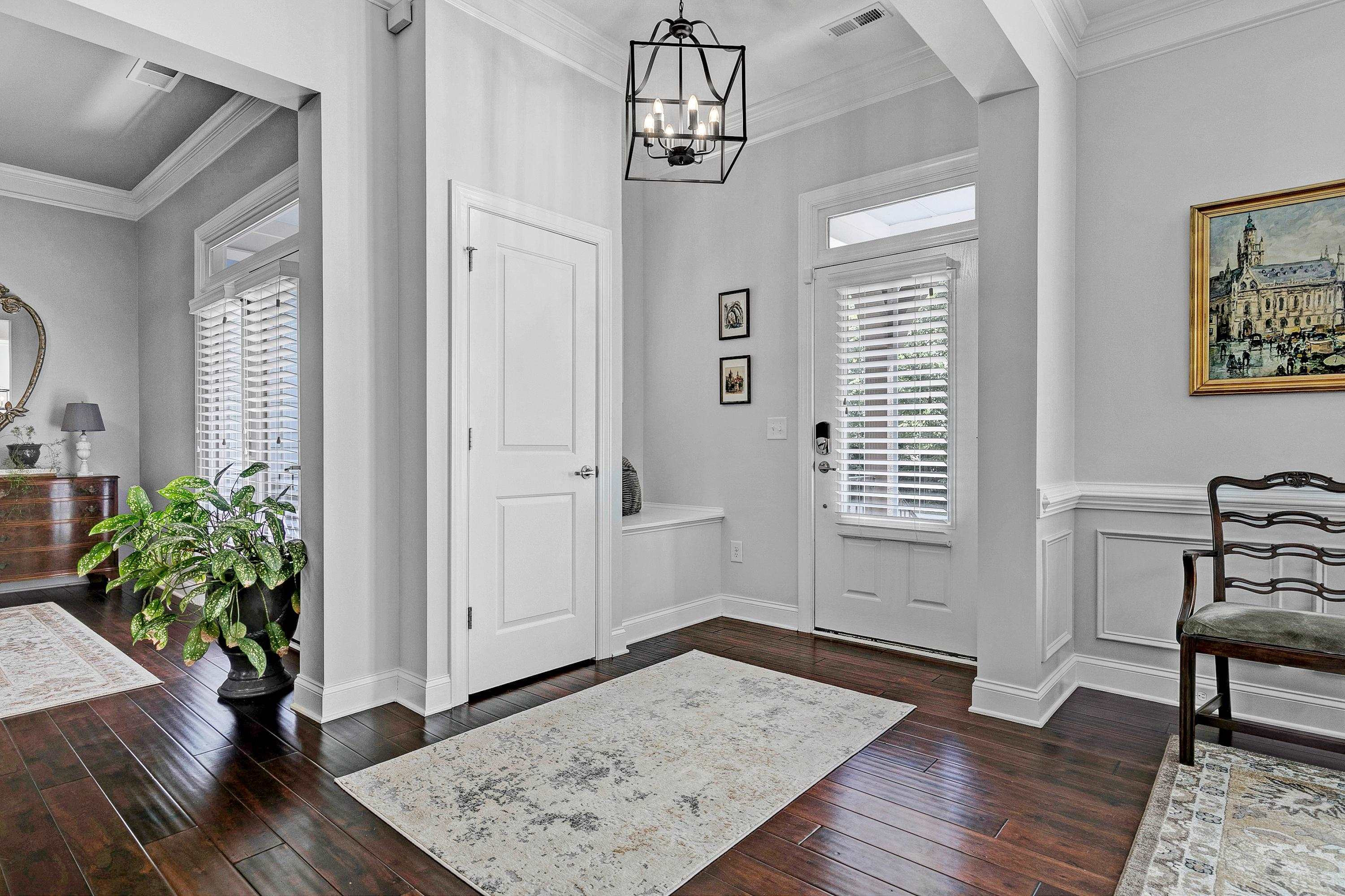 1529 Fullerton Place Raleigh, NC 27607 - Photo 5 of 53 a view of a livingroom with wooden floor and furniture