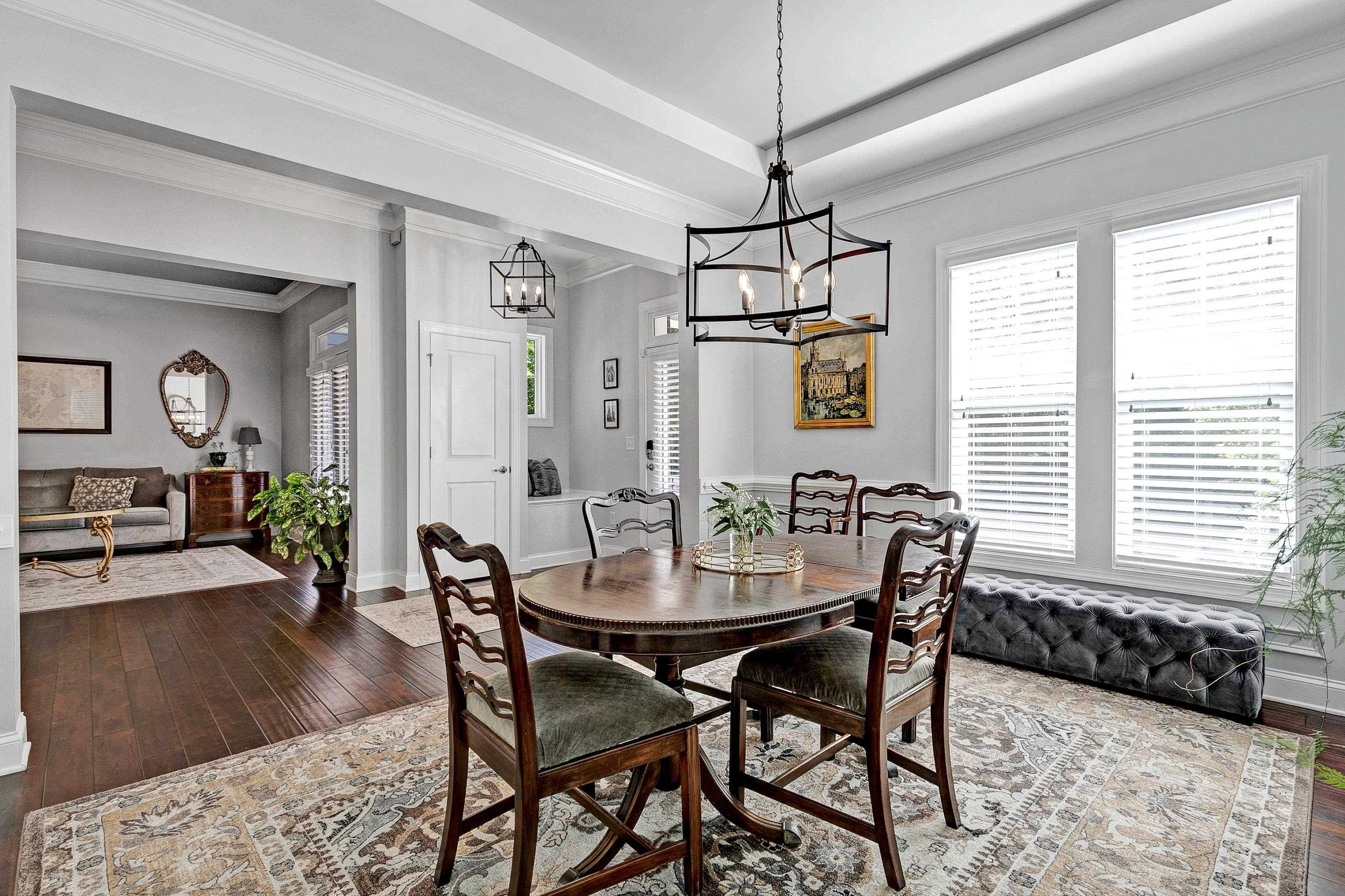 1529 Fullerton Place Raleigh, NC 27607 - Photo 7 of 53 a view of a dining room with furniture window and wooden floor