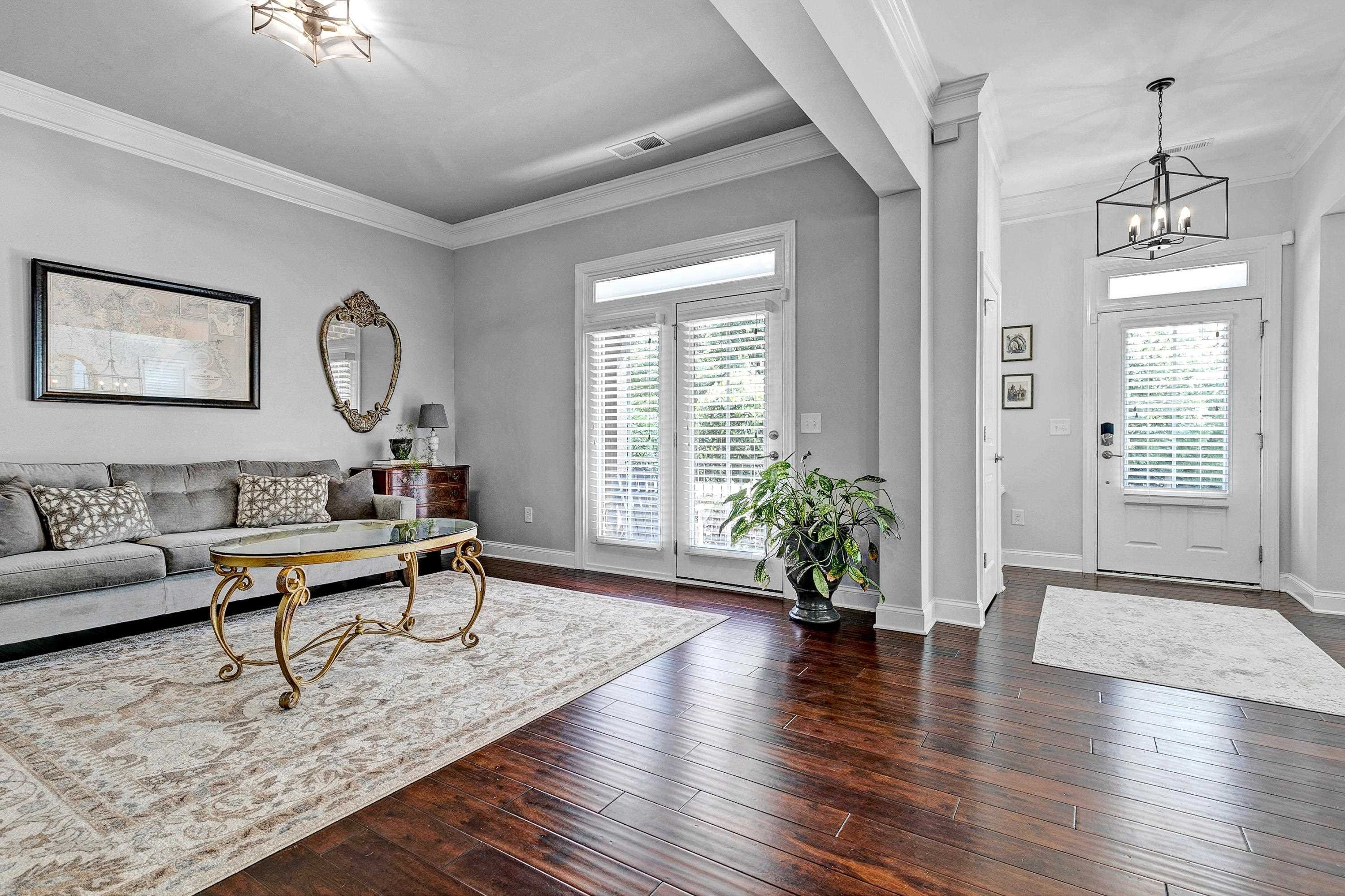 1529 Fullerton Place Raleigh, NC 27607 - Photo 8 of 53 a living room with furniture and a large window