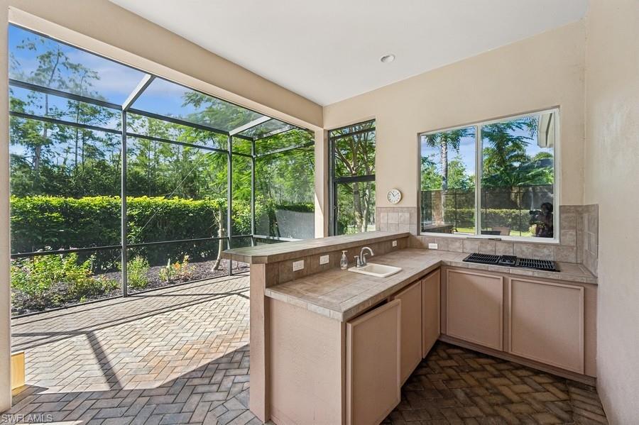 7488 Treeline Drive Naples, FL 34119 - Photo 19 of 22 Summer Kitchen