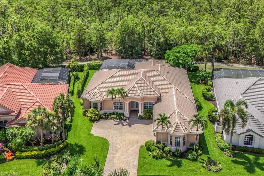 7488 Treeline Drive Naples, FL 34119 - Photo 2 of 22 Aerial view of property and surrounding area
