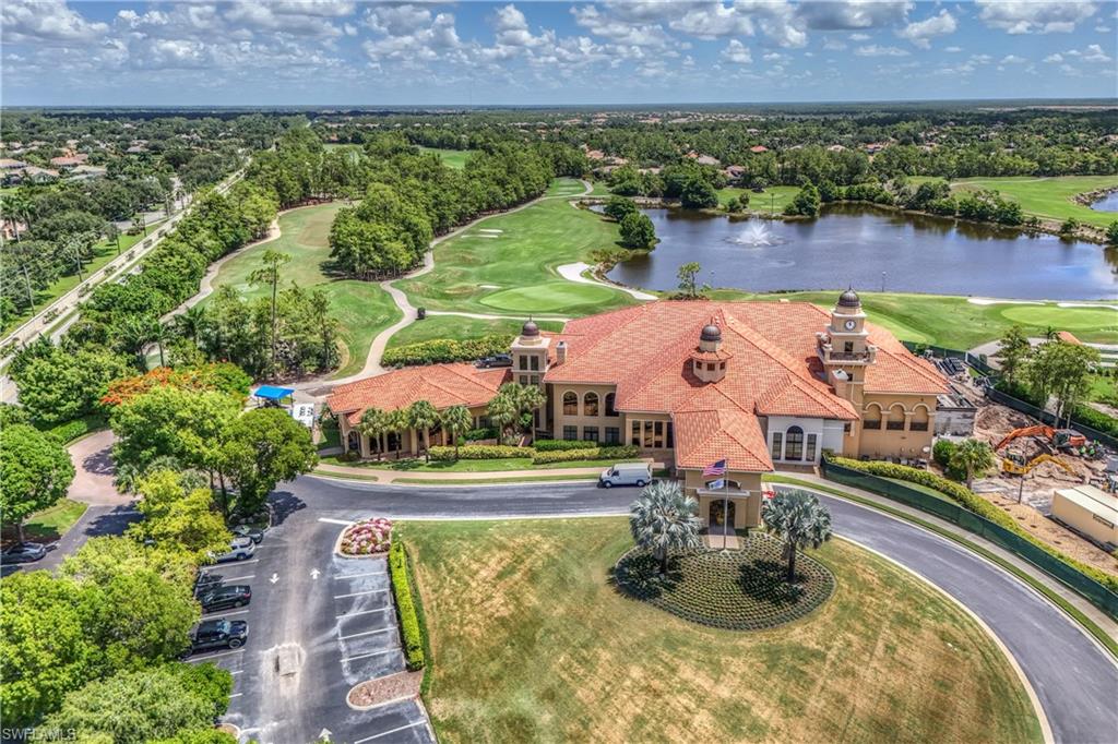 7488 Treeline Drive Naples, FL 34119 - Photo 21 of 22 Drone / aerial view of a large body of water and a golf course
