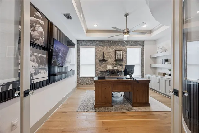 a living room with stainless steel appliances kitchen island granite countertop furniture and a kitchen view