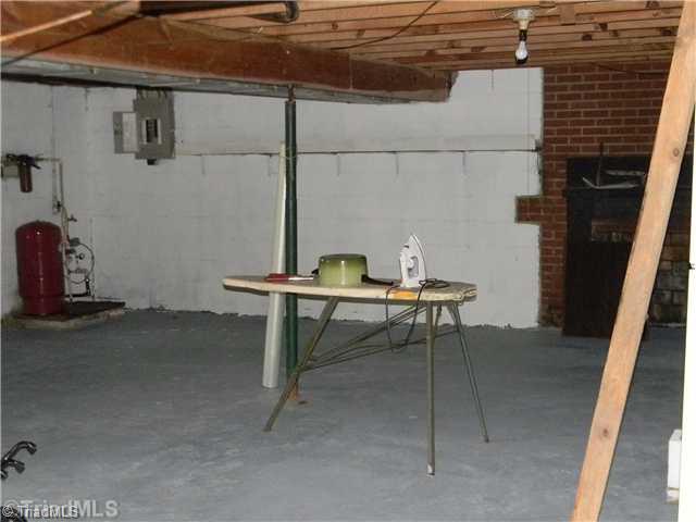 1614 Clingman Road Ronda, NC 28670 - Photo 11 of 12 Other. Full size basement with fireplace.
