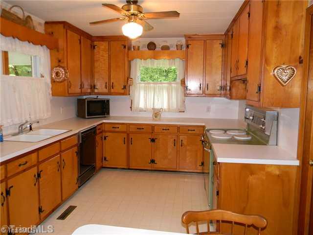 1614 Clingman Road Ronda, NC 28670 - Photo 5 of 12 Kitchen. Large open kitchen with lots of cabinets.