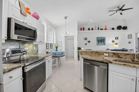 $599,000 | 6032 Rossmoor Lakes Court, Boynton Beach, FL 33437