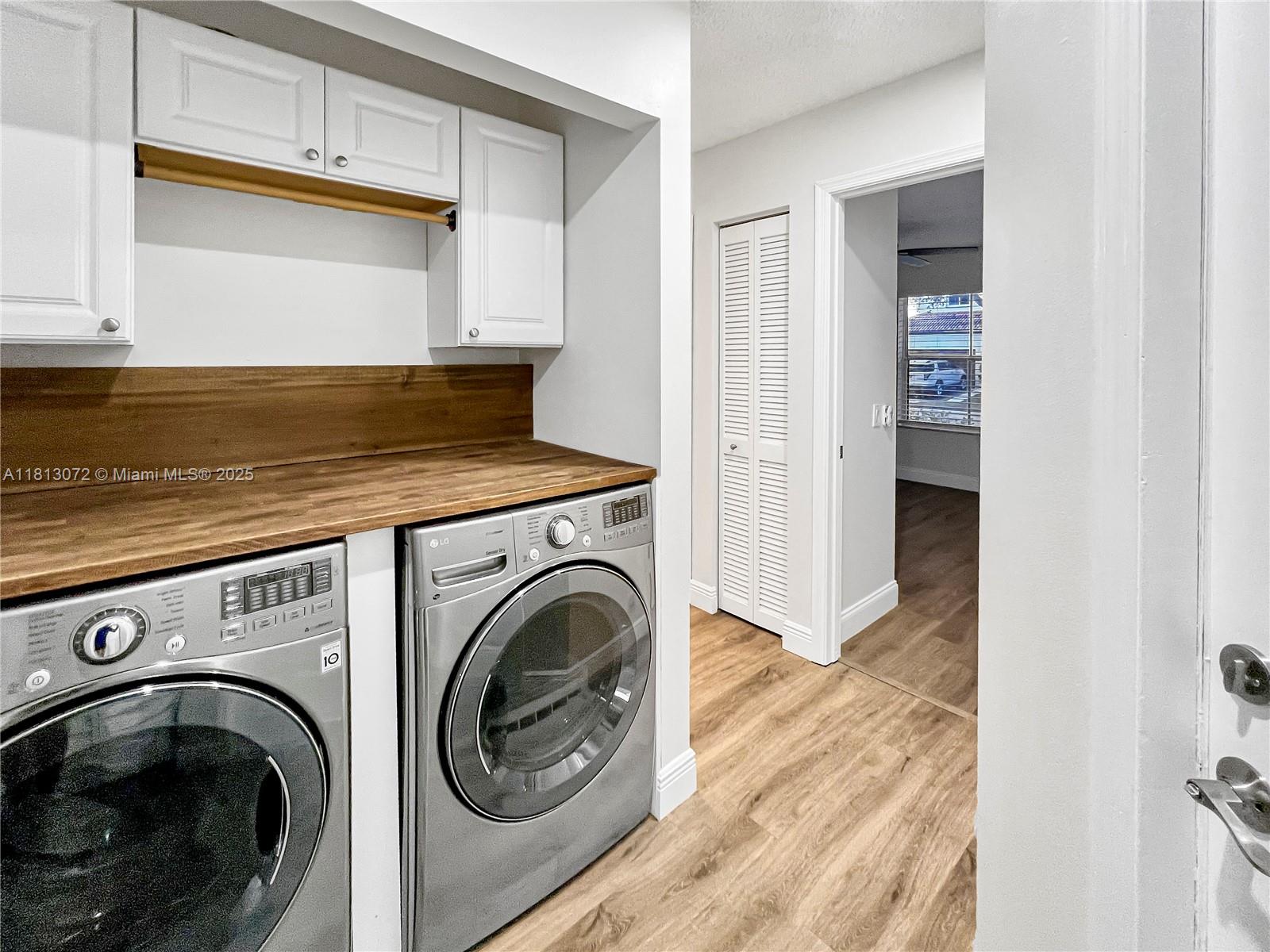 841 Stanton Drive Weston, FL 33326 - Photo 22 of 25 a view of entryway with washer and dryer