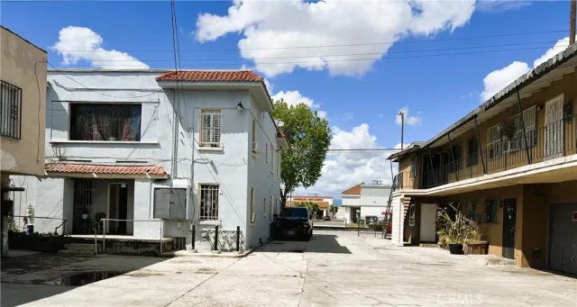 a view of a building with a street