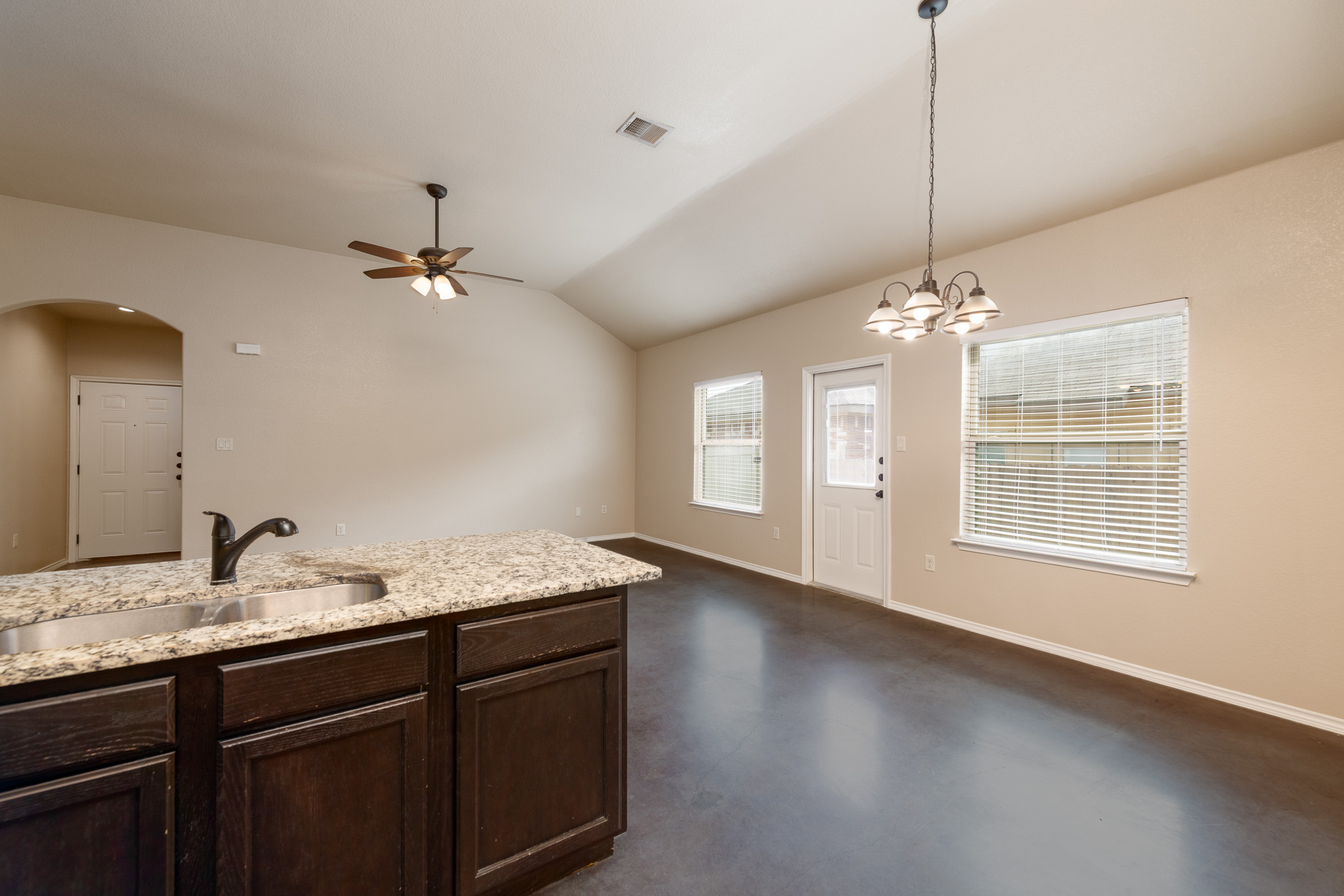 448 Jack Rabbit Lane, Unit A Buda, TX 78610 - Photo 8 of 19 a bathroom with a sink double vanity and a mirror