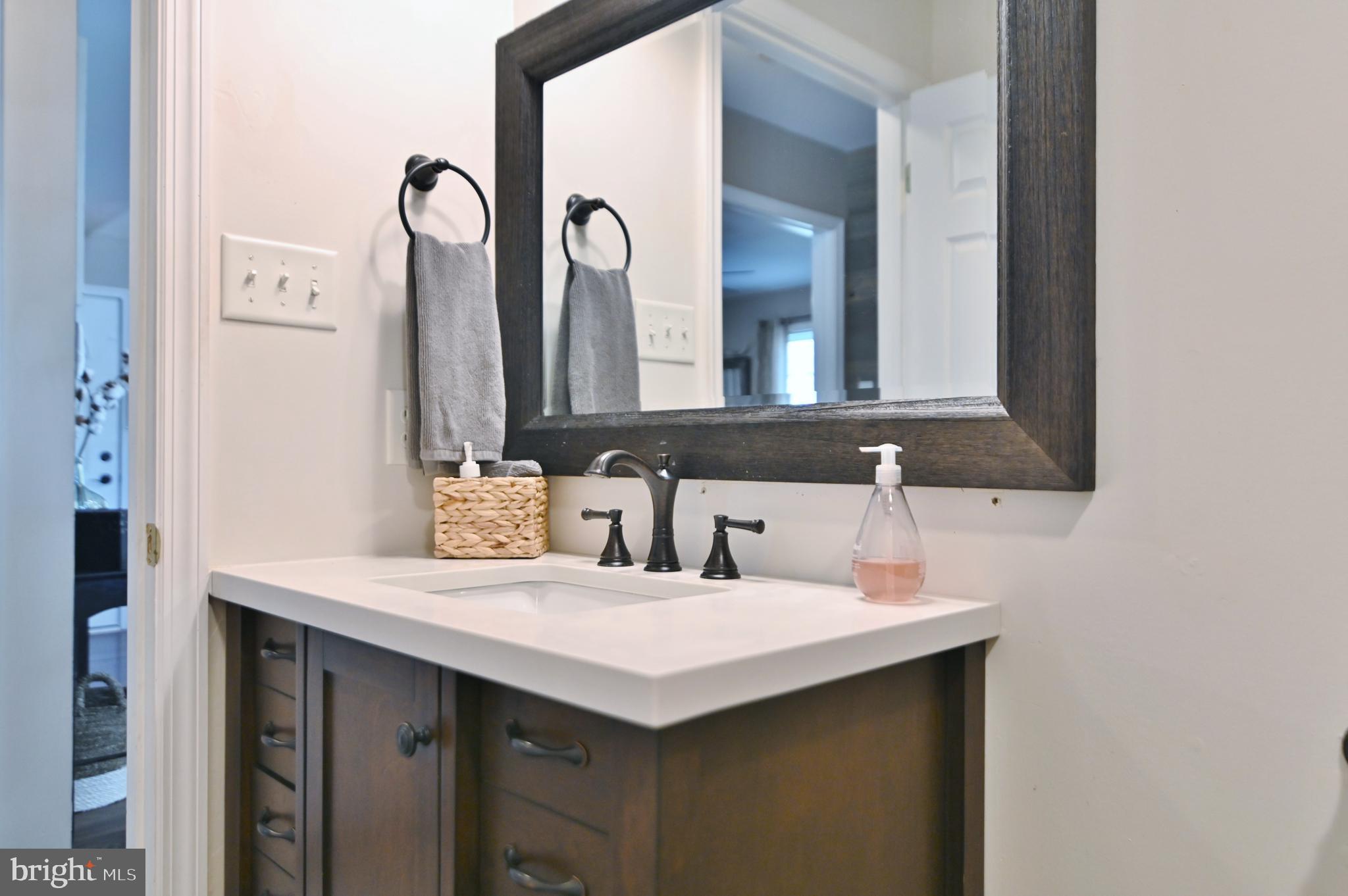 36 Pine Way Mount Jackson, VA 22842 - Photo 32 of 49 a bathroom with a sink and a mirror