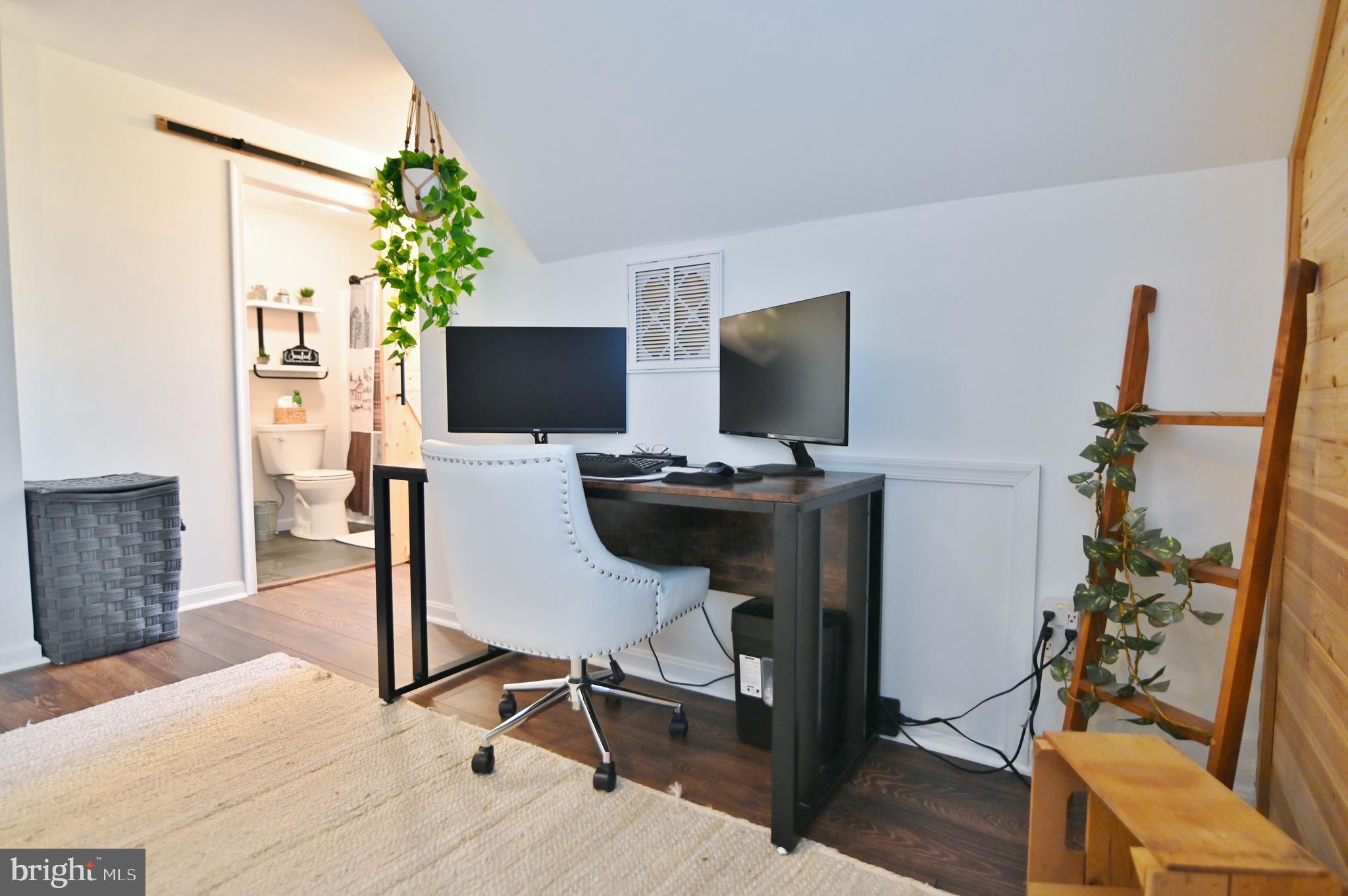 36 Pine Way Mount Jackson, VA 22842 - Photo 36 of 49 a view of a workspace with furniture and a potted plant