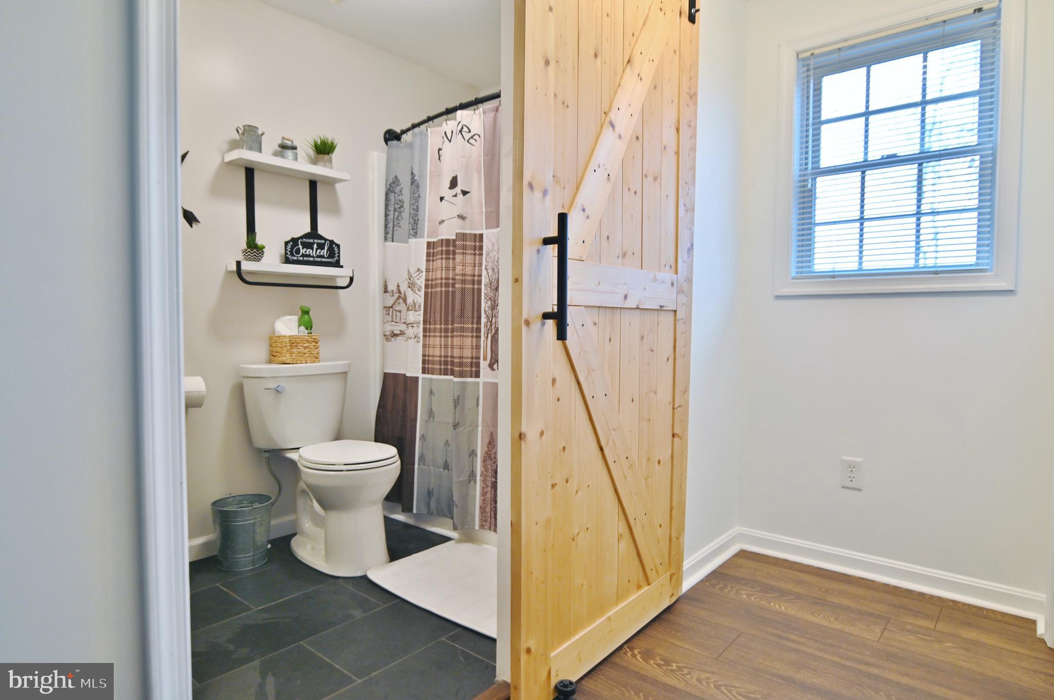 36 Pine Way Mount Jackson, VA 22842 - Photo 37 of 49 a bathroom with a toilet and a shower