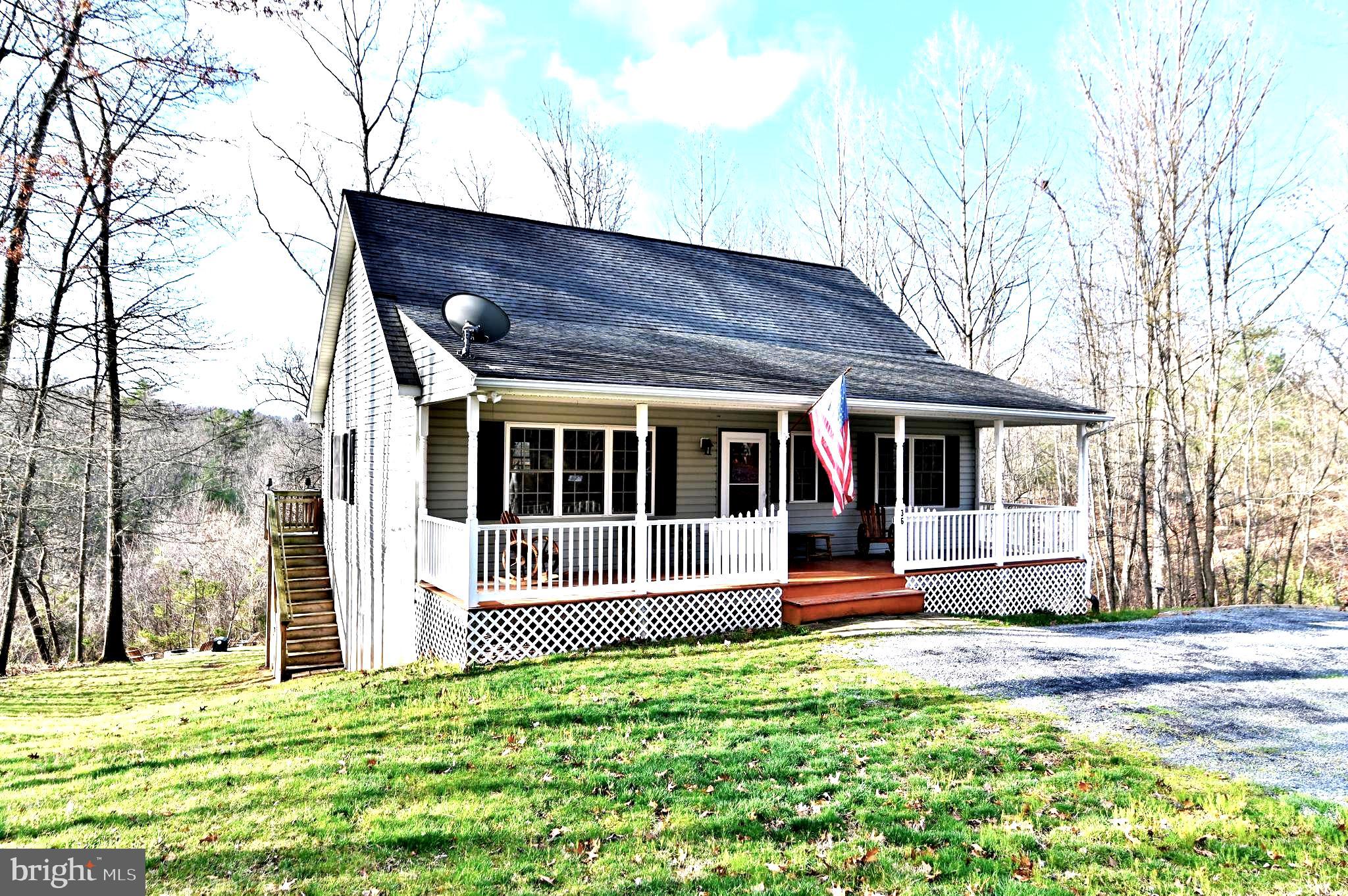 36 Pine Way Mount Jackson, VA 22842 - Photo 4 of 49 a front view of a house with a yard