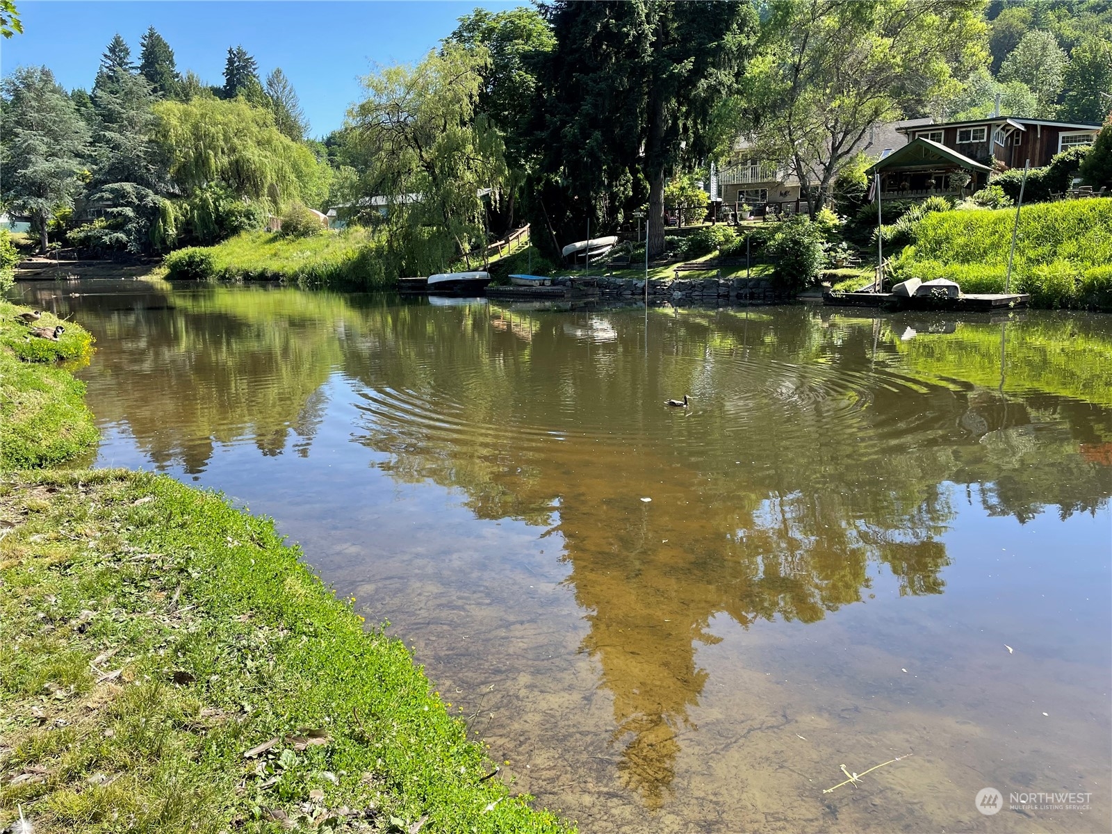 17511 113th Avenue Northeast Bothell, WA 98011 - Photo 11 of 14 a view of a lake with houses