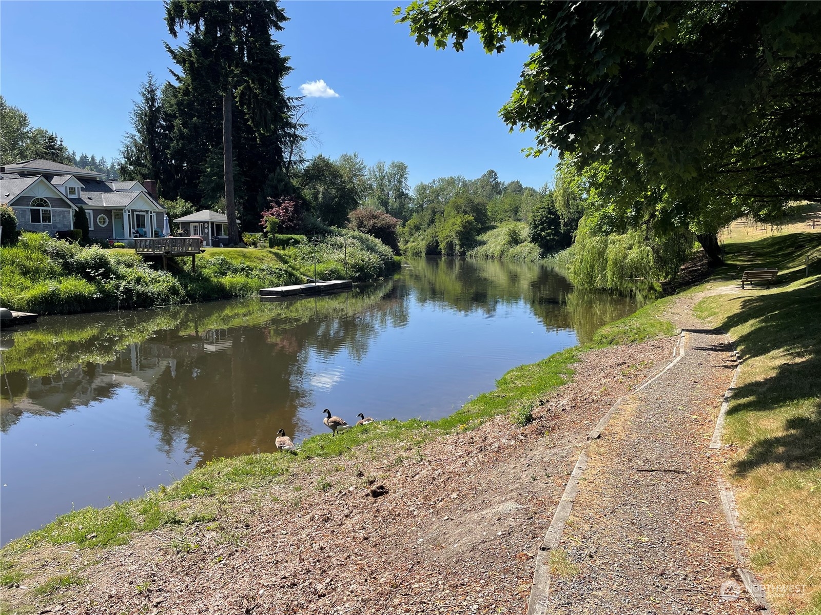17511 113th Avenue Northeast Bothell, WA 98011 - Photo 12 of 14 a view of a lake with houses
