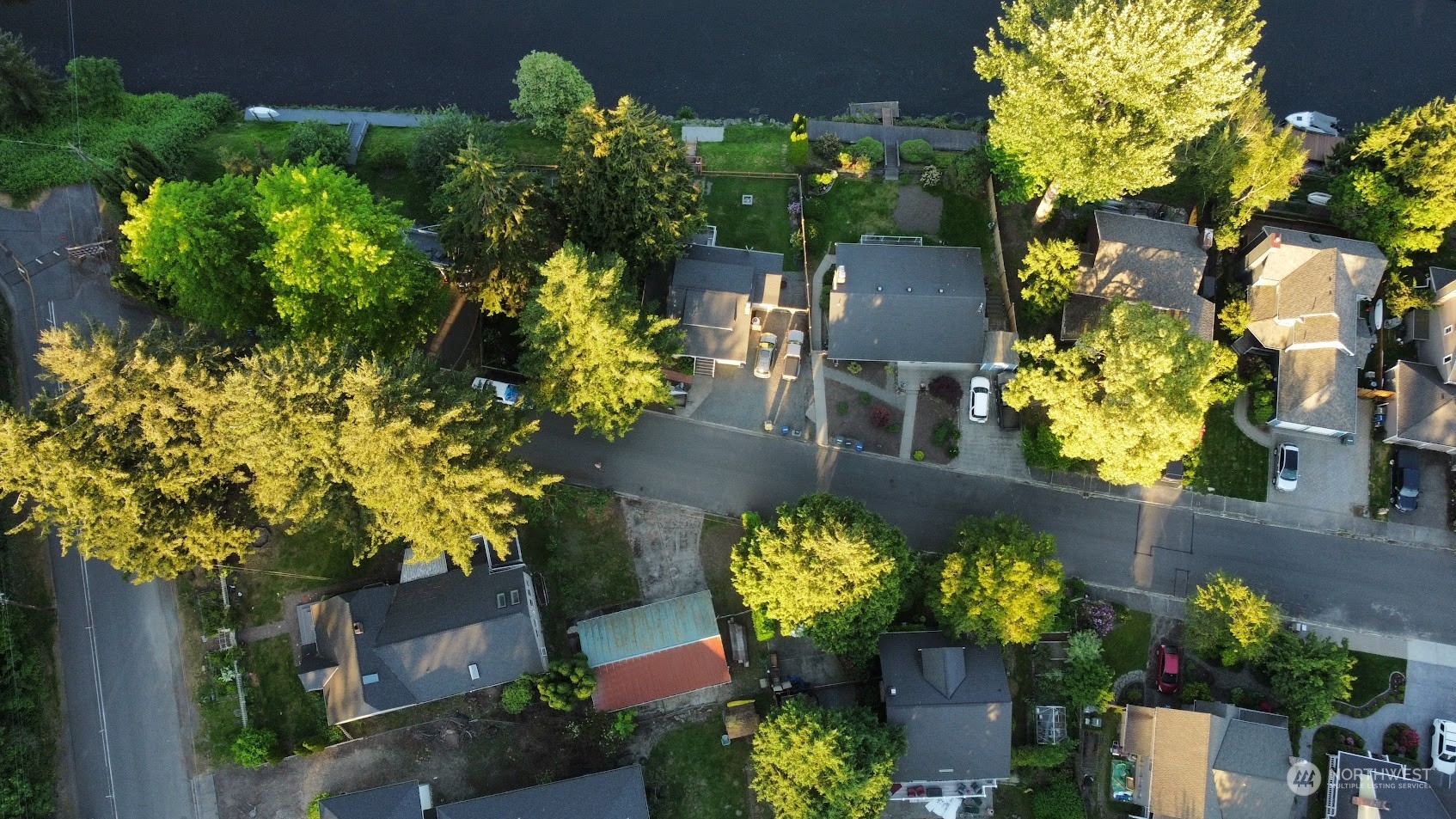 17511 113th Avenue Northeast Bothell, WA 98011 - Photo 8 of 14 a bunch of flowers in front of the house