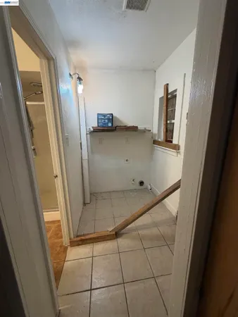 a bed room with furniture and a window