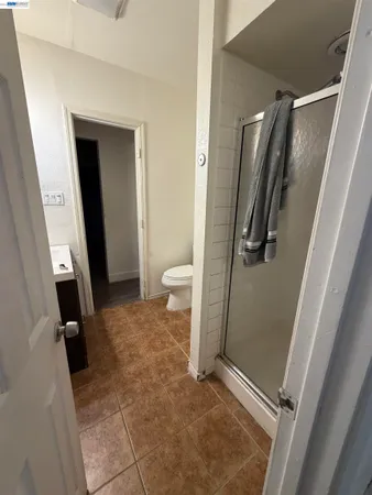 a view of a refrigerator in a kitchen