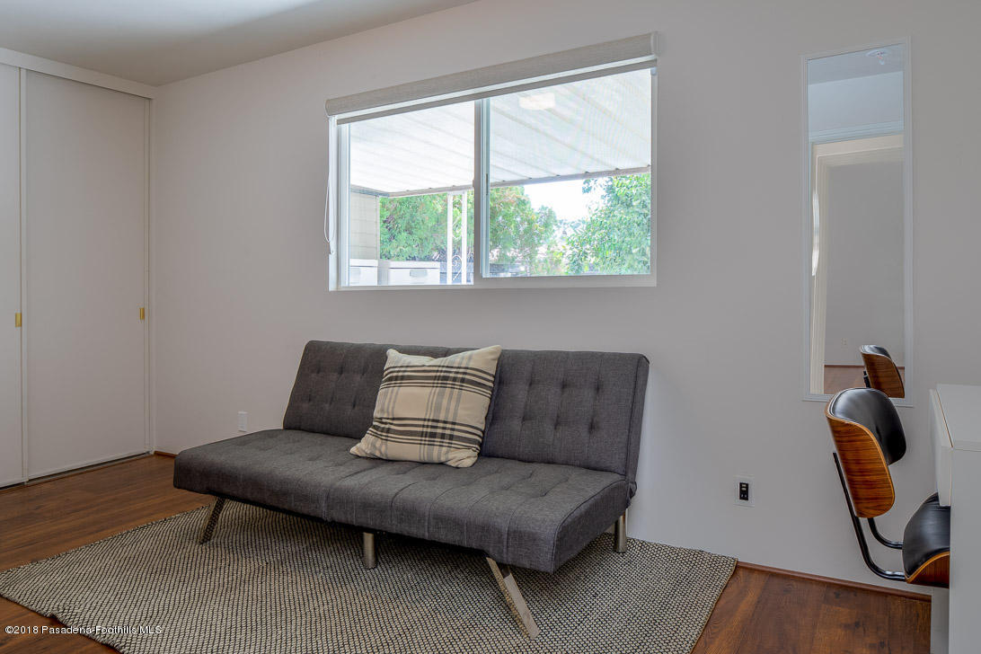 70081 Cobb Road Rancho Mirage, CA 92270 - Photo 13 of 17 a living room with furniture and a window