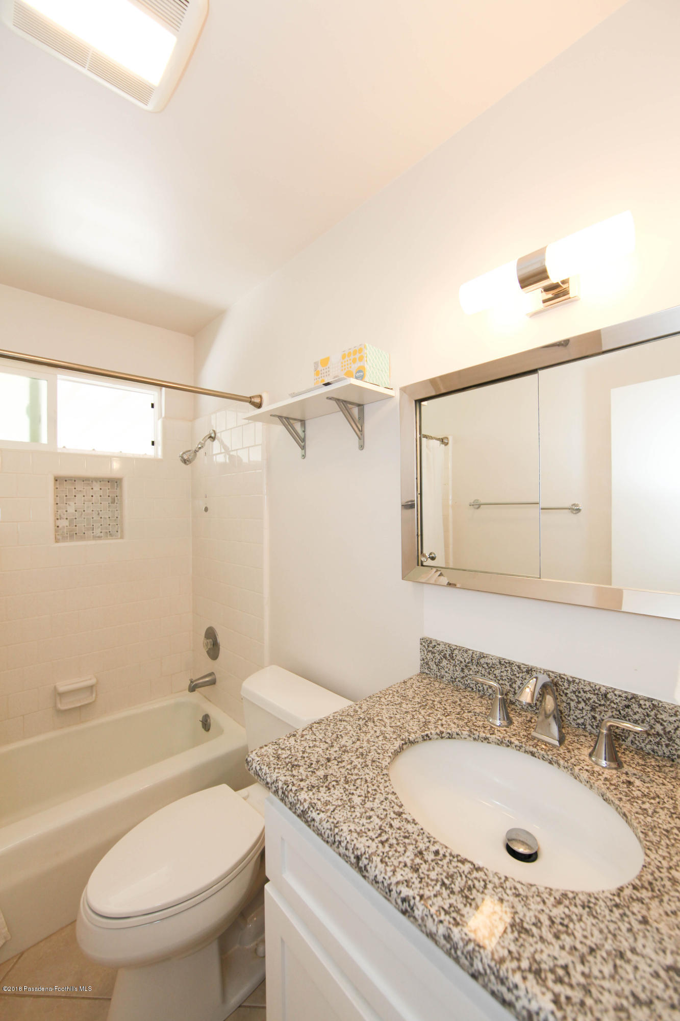 70081 Cobb Road Rancho Mirage, CA 92270 - Photo 14 of 17 a bathroom with a granite countertop sink a toilet and shower