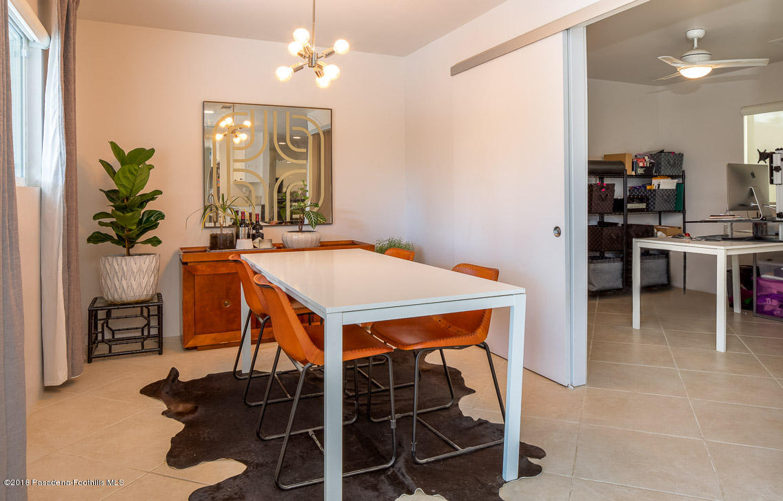 70081 Cobb Road Rancho Mirage, CA 92270 - Photo 6 of 17 a dining room with a table chairs and entryway
