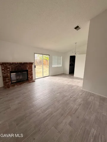 a view of livingroom with furniture and window