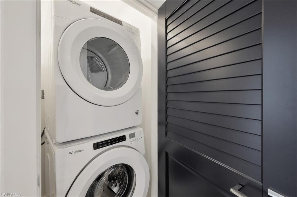 1060 6th Street South, Unit 1060 Naples, FL 34102 - Photo 31 of 31 a close up view of a washer and dryer