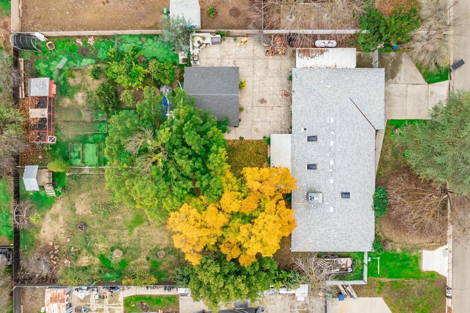12126 Topper Road Madera, CA 93636 - Photo 35 of 40 an aerial view of residential houses with outdoor space