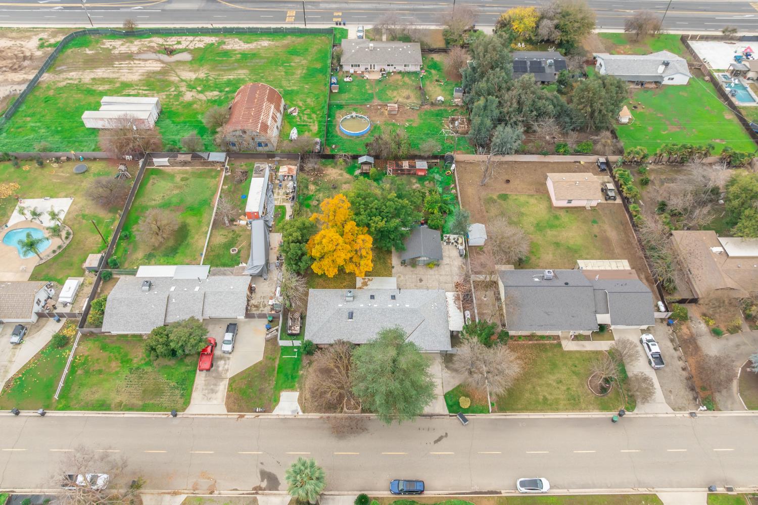 12126 Topper Road Madera, CA 93636 - Photo 37 of 40 an aerial view of residential houses with outdoor space