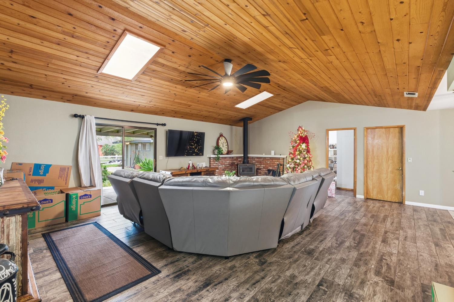 12126 Topper Road Madera, CA 93636 - Photo 5 of 40 a living room with furniture and a table