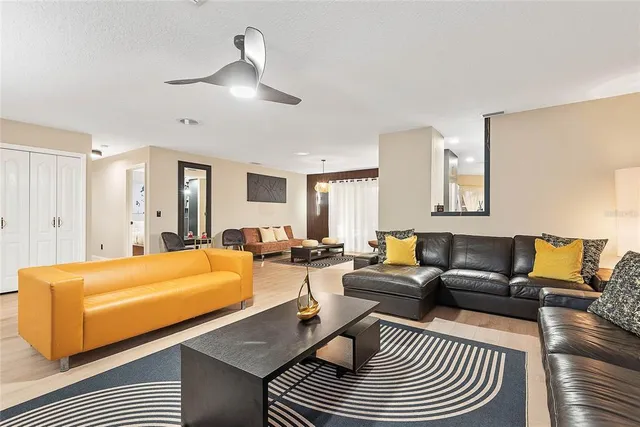 a living room with furniture and a couch