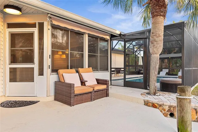a view of a swimming pool with a patio