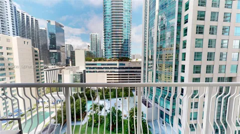a view of a large building from a balcony