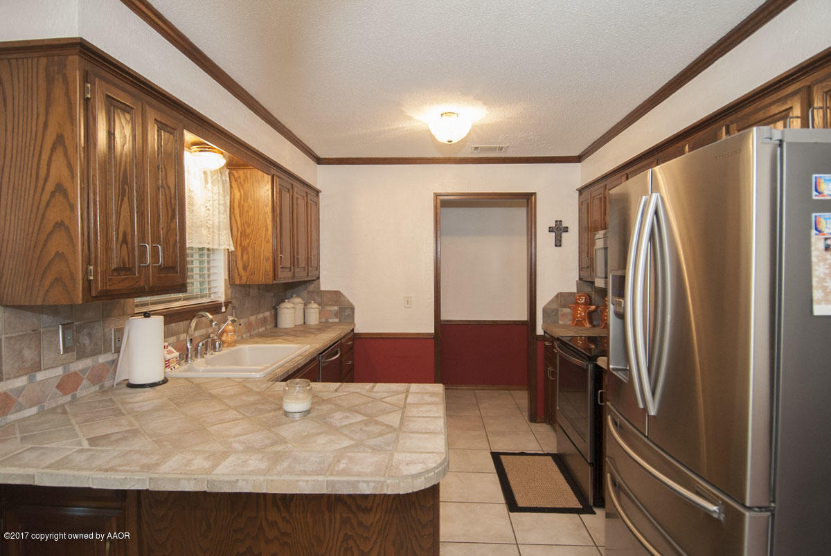 6916 Old Kent Road Amarillo, TX 79109 - Photo 4 of 31 KITCHEN VIEW 1