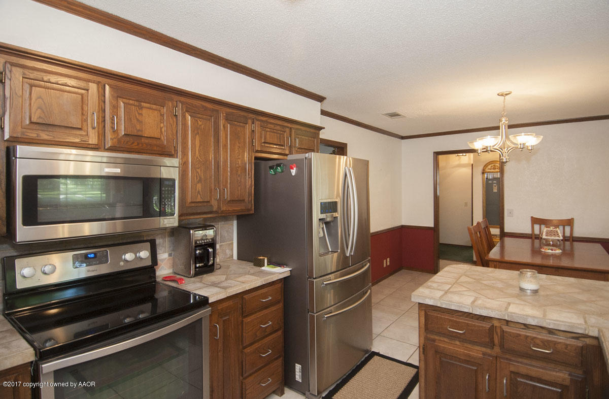 6916 Old Kent Road Amarillo, TX 79109 - Photo 6 of 31 KITCHEN VIEW 3