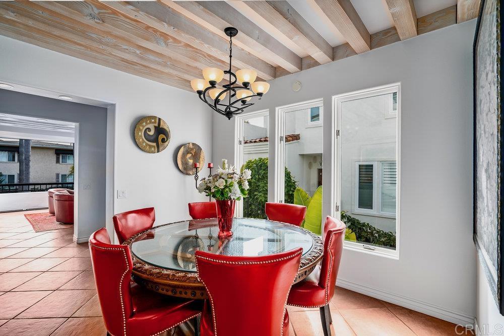 332 Gravilla Street La Jolla, CA 92037 - Photo 13 of 49 a dining room with furniture a livingroom and chandelier